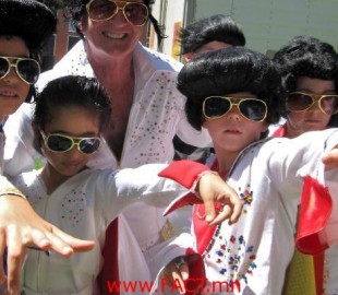 Young Elvis impersonators strike a pose