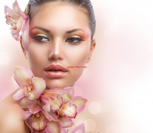 Beautiful Girl With Orchid Flowers. Perfect Make-up