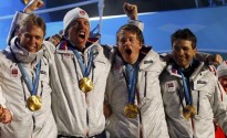 Gold medallists Norway's Boe, Bjoerndalen, Svendsen and Hanevold celebrate during medals ceremony for men's 4 X 7.5 kilometres relay biathlon event at Vancouver 2010 Winter Olympics at Whistler