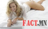 Woman-lying-on-bed-with-Laptop-615x350