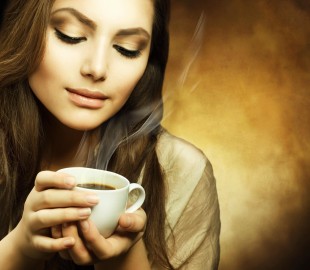Beautiful Woman with cup of Coffee