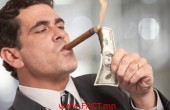 1495004823_rich-hnwi-billionaire-lighting-cigar-shutterstock-740x360