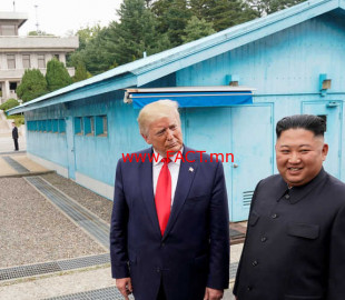 FILE PHOTO: Trump meets with North Korean leader Kim Jong Un at the DMZ on the border of North and South Korea